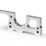 Xray T2'007 Alu Front Lower Susp. Adjust. Bulkhead XR302018